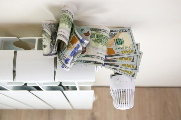 radiator and money the concept of payment for heating 104376 1976