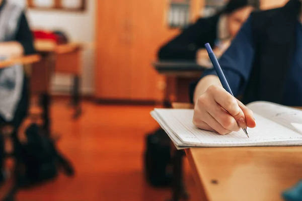 depositphotos 350388900 stock photo the student writes in a