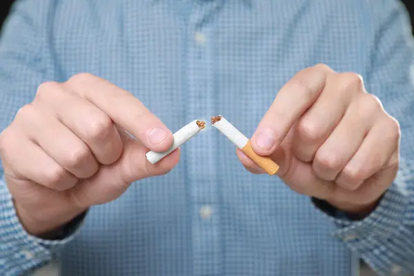 depositphotos 675224658 stock photo stop smoking concept man holding