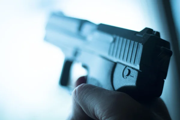 depositphotos 102325992 stock photo automatic 9mm pistol handgun weapon