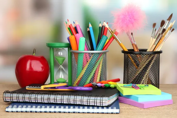 depositphotos 19503785 stock photo school supplies with apple on