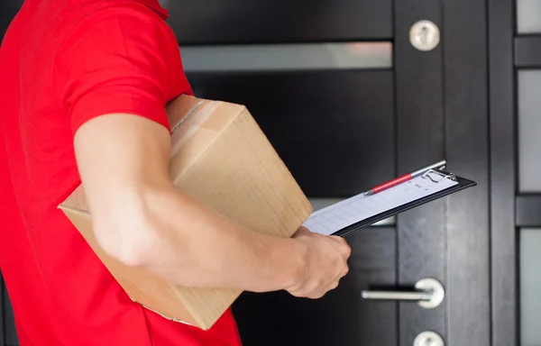 depositphotos 54161639 stock photo delivery man at front door